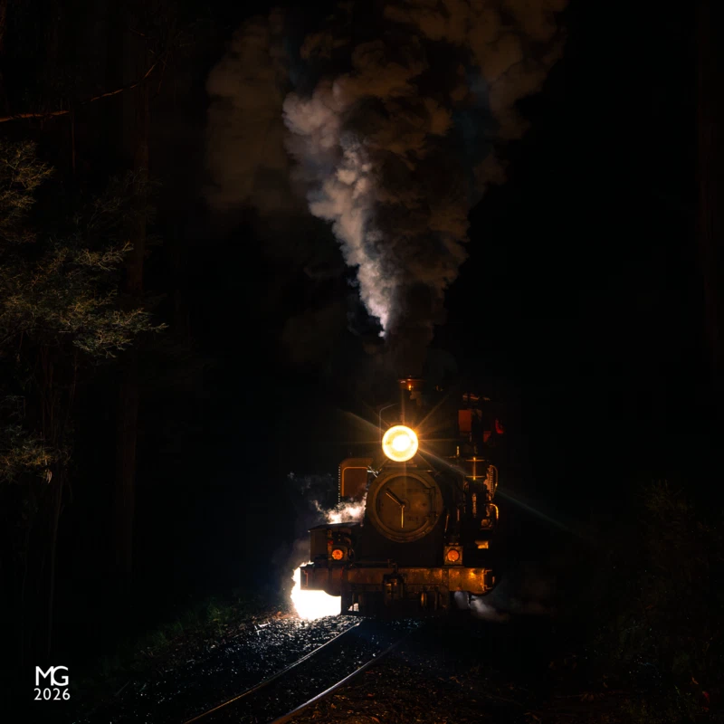 Darkness Surrounds Night train regular 12A roars uphill through Selby on a frosty spring evening in 2018 with a dinner train bound for Nobelius Siding.