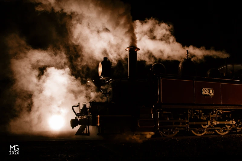 At night Steam and smoke blend into one another as 12A prepares to depart Menzies Creek with a dinner train for Nobelius Siding.