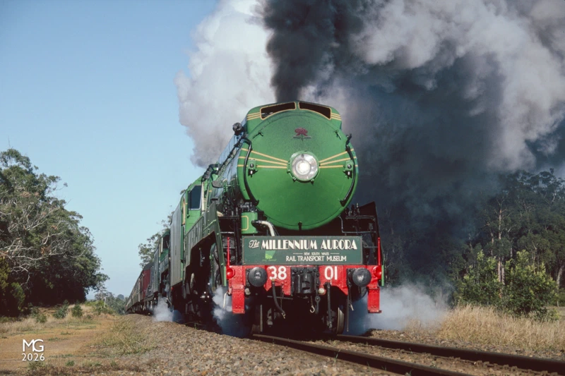 Heft Climbing their way inland from Portland, 3801 and 3830 approach Milltown Mission road bound for their overnight stop at Dimboola.