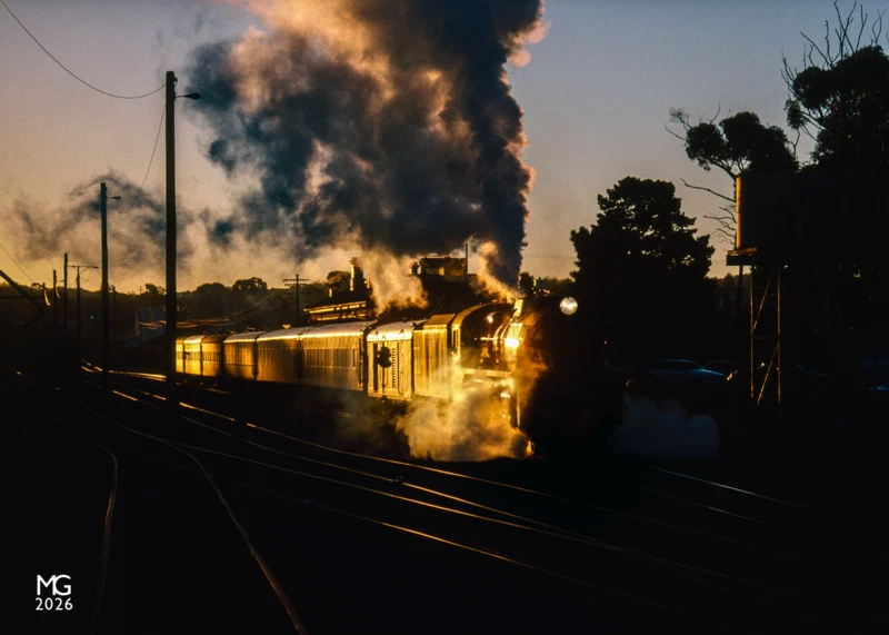 Sunset departure Returning to Melbourne with tour train chartered by the Australian Railway Historical Society, R711 storms out of St Arnaud leaving the winter sun to set behind it.Beyond Maryborough, the line from Dunolly through St Arnaud was converted in 2018 from Victoria's broad gauge to the national standard gauge. Although scenes like this are theoretically possible to reproduce - as classmate R766 has also been converted to standard gauge - the rationalisation of the yard including the disconnection of the turntable makes it highly unlikely we'll see an R class at St Arnaud any time soon.